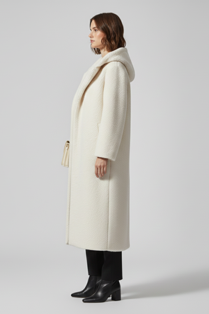 Women’s long coat with hood and textured surface