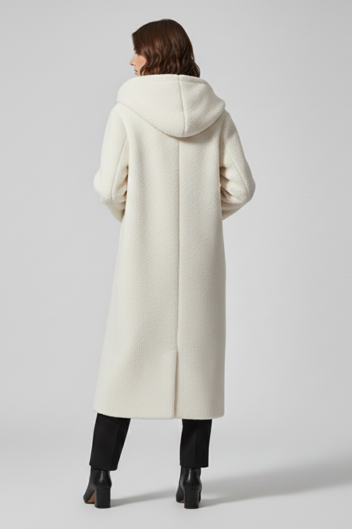 Women’s long coat with hood and textured surface